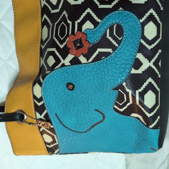 Relic Faux Leather Satchel and Wallet with Elephant/Floral Design. - Picture 3 of 16